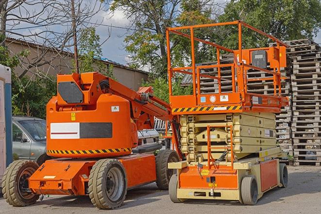 warehouse worker operating forklift for inventory management in Whitehall MI
